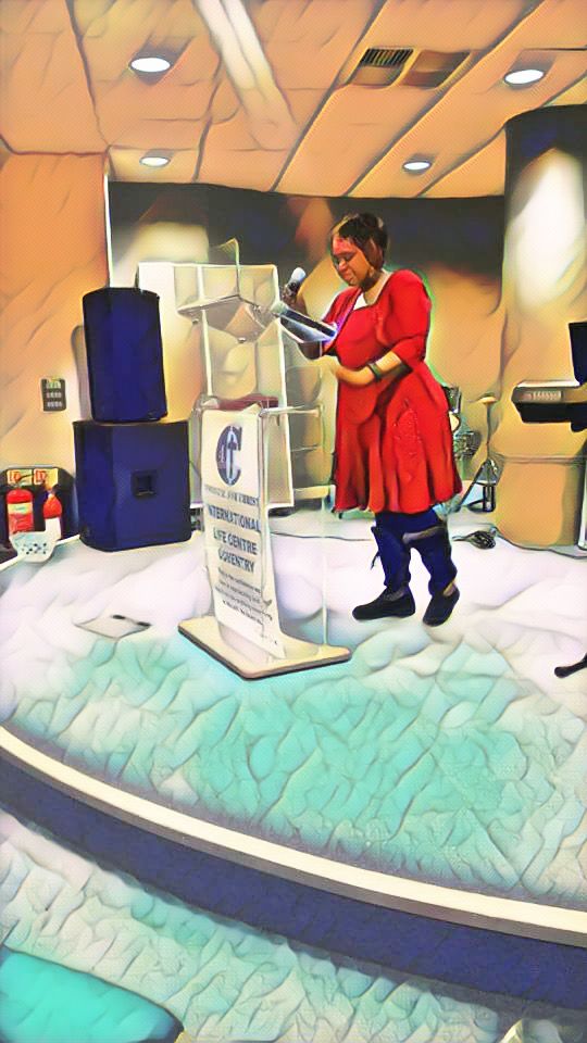 Farisai speaking up on a conference at the International Life Centre at Coventry.